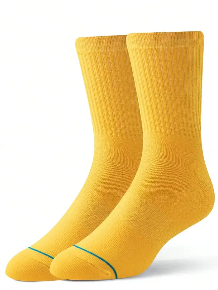 1 paire de chaussettes longues décontractées jaunes pour hommes, chaussettes hip-hop de couleur unie