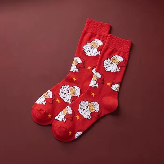 1 paire de chaussettes unisexes avec semelles rouges festives ornées de motifs Père Noël et d'étoiles