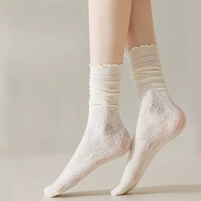 Chaussettes en dentelle fine et respirante en maille mi-mollet pour femme avec bordure