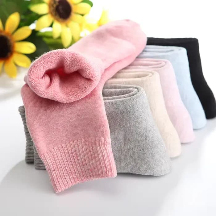 1 paire de chaussettes chaudes d'hiver en laine pour femmes