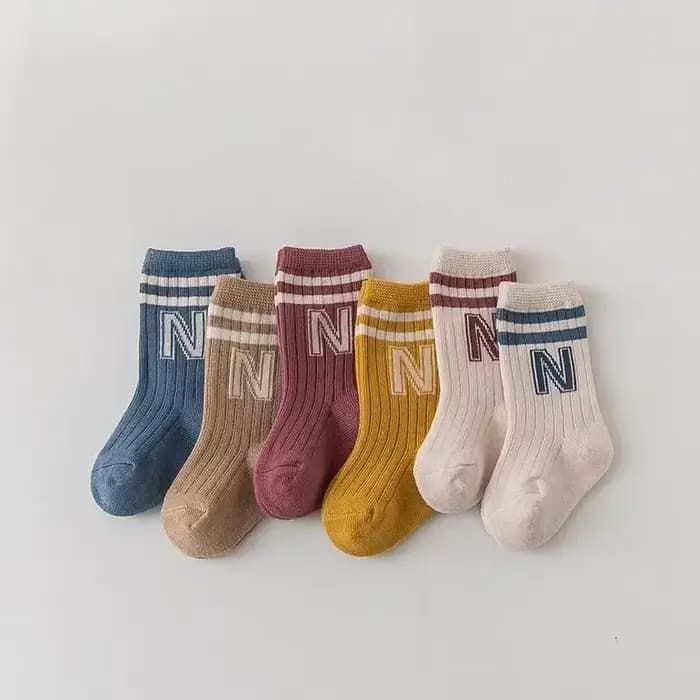 Chaussettes longues tricotées en coton doux pour bébé
