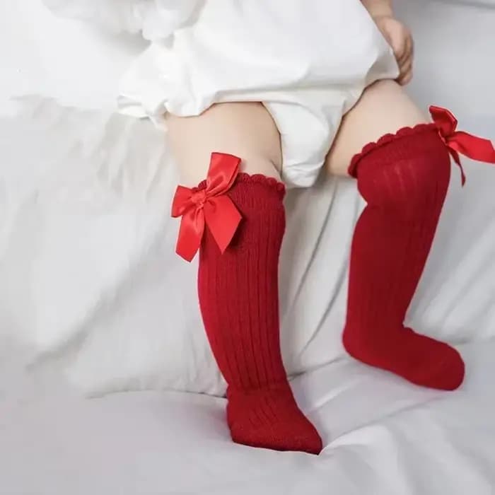 Chaussettes Tube hautes avec nœud papillon rouge