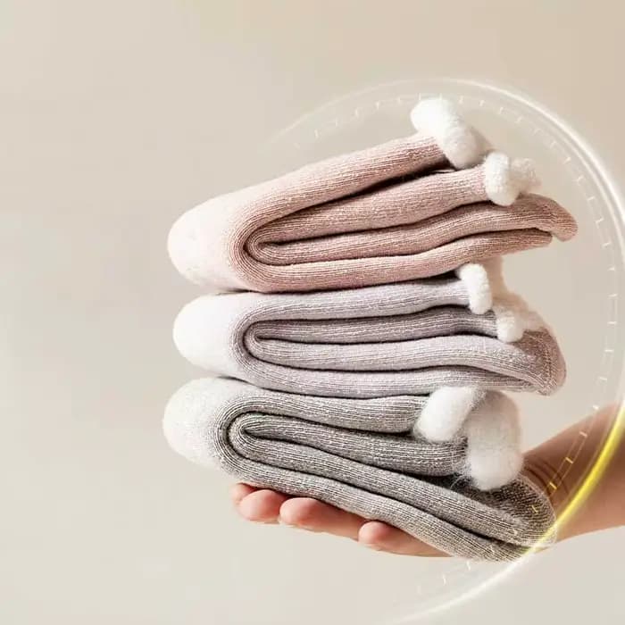 Automne et hiver nouvelles chaussettes épaisses pour femmes avec velours épaissi chaud géant épais corail
