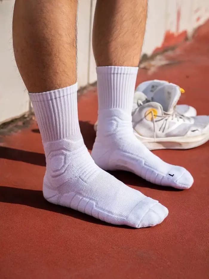 1 paire de chaussettes de basket-ball mi-longues avec fond de serviette épais