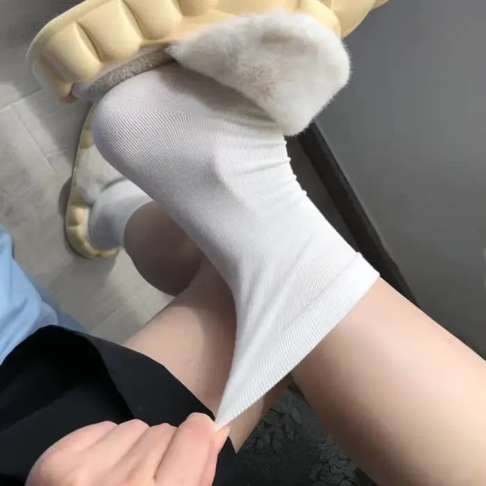 Chaussettes noires et blanches pour femmes et hommes