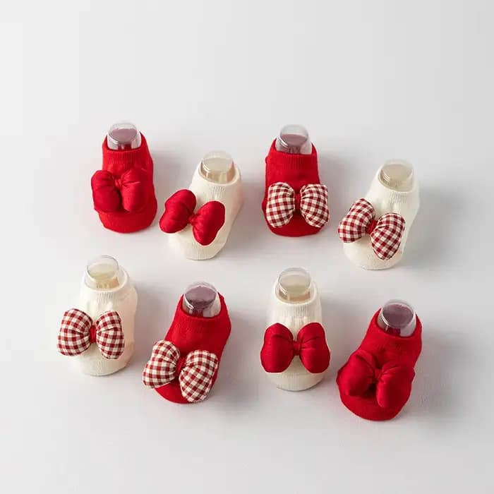 Chaussettes de noël à nœud rouge pour bébé