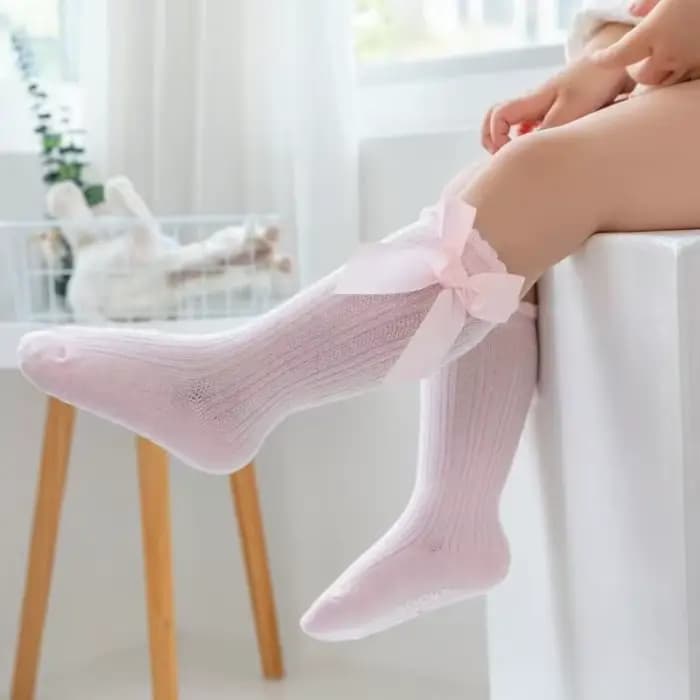 Chaussettes Tube hautes avec nœud papillon rouge