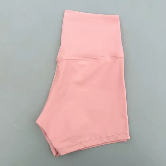 Sexy couleur unie femmes Fitness Sport court taille haute athlétique Yoga jambe courte cyclisme entraînement complet Jogging Squat preuve