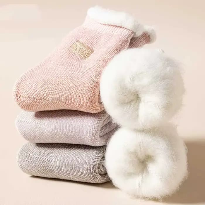 Automne et hiver nouvelles chaussettes épaisses pour femmes avec velours épaissi chaud géant épais corail
