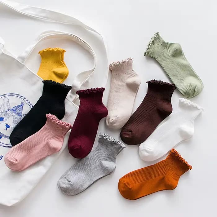 1 paire de chaussettes à volants pour femmes