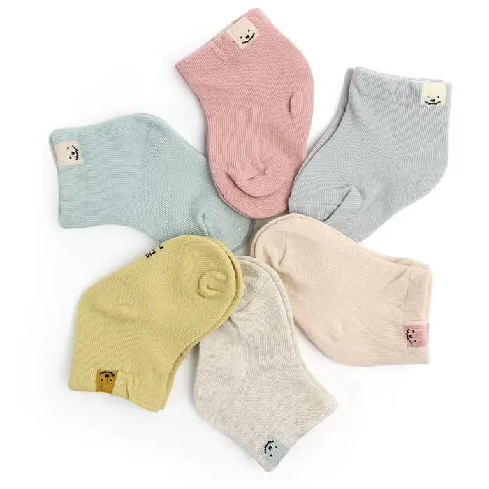 Chaussettes tricotées en coton doux pour bébé