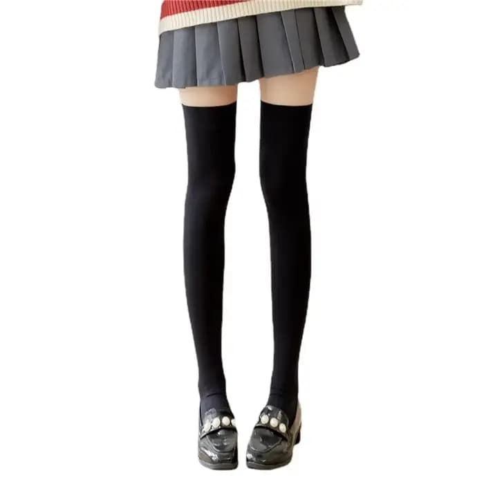 Chaussettes longues noires et blanches de couleur unie