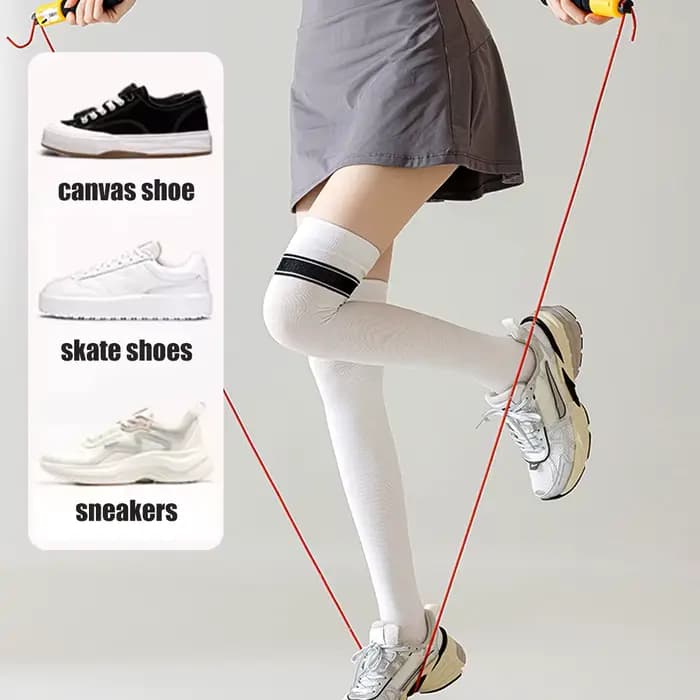 1 paire de chaussettes hautes à rayures au-dessus du genou