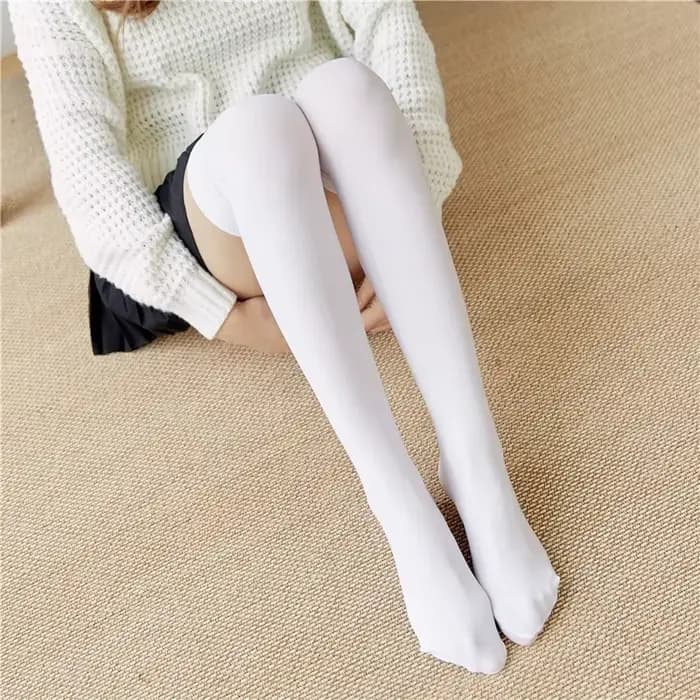 Chaussettes longues noires et blanches de couleur unie