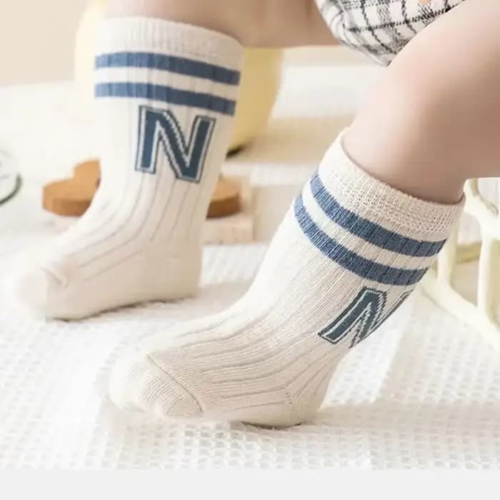 Chaussettes longues tricotées en coton doux pour bébé