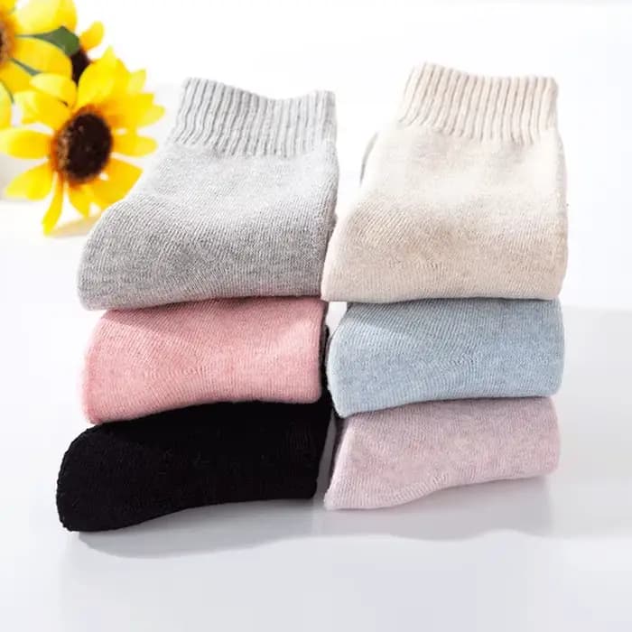 1 paire de chaussettes chaudes d'hiver en laine pour femmes
