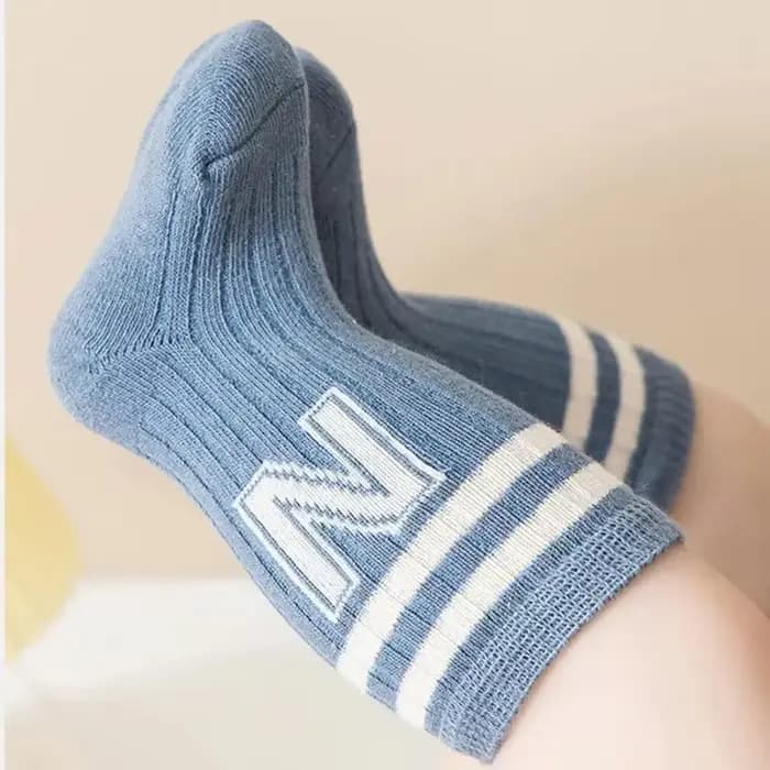Chaussettes longues tricotées en coton doux pour bébé