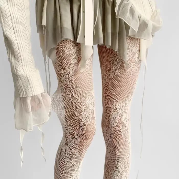 Collants en maille de dentelle ajourée blanche et noire