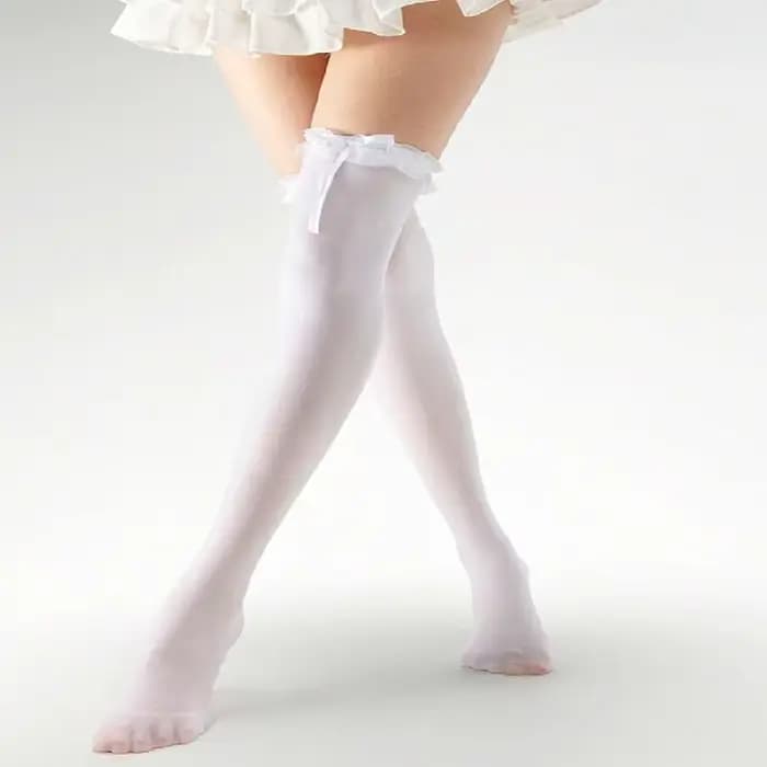 1 paire de collants en dentelle au-dessus du genou avec nœuds papillon
