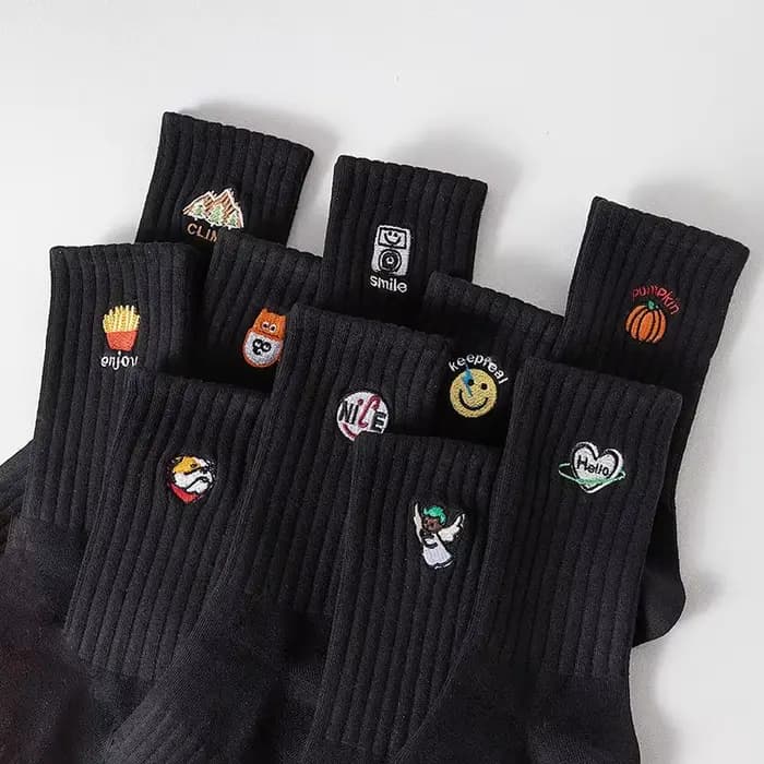 Chaussettes unisexes noires et blanches avec broderie de dessin animé