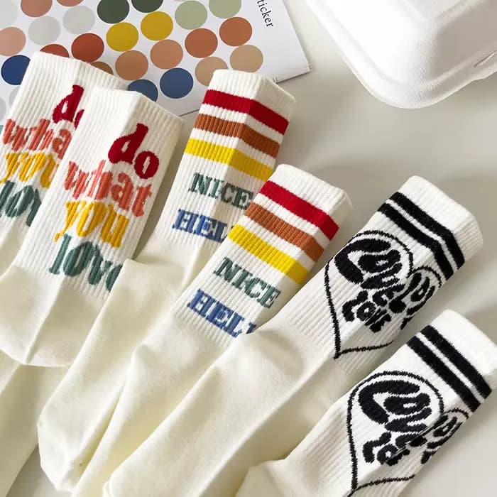 Femme drôle rayé lettre coton chaussette Harajuku doux fleur imprimé Hip Hop blanc chaussettes de sport décontracté respirant heureux longs Soxs