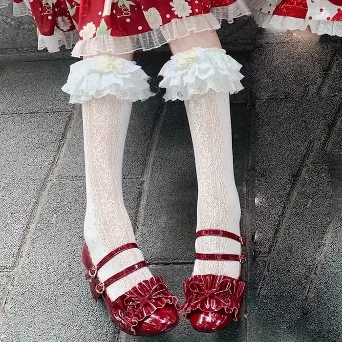 1 paire de chaussettes Lolita en dentelle blanche lait