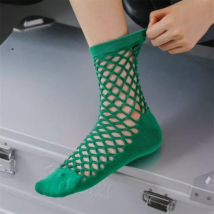 Chaussettes monochromes en résille pour femmes