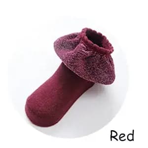 Une paire de chaussettes à volants en dentelle pour filles