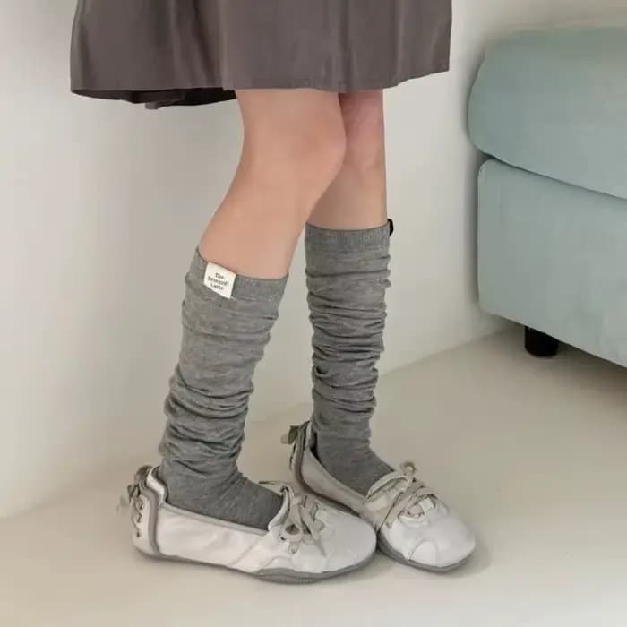 Chaussettes longues en maille respirante pour femme