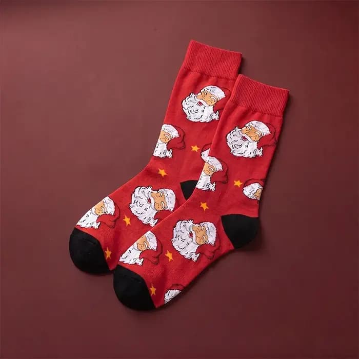 1 paire de chaussettes unisexes avec semelles rouges festives ornées de motifs Père Noël et d'étoiles