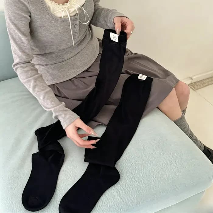 Chaussettes longues en maille respirante pour femme